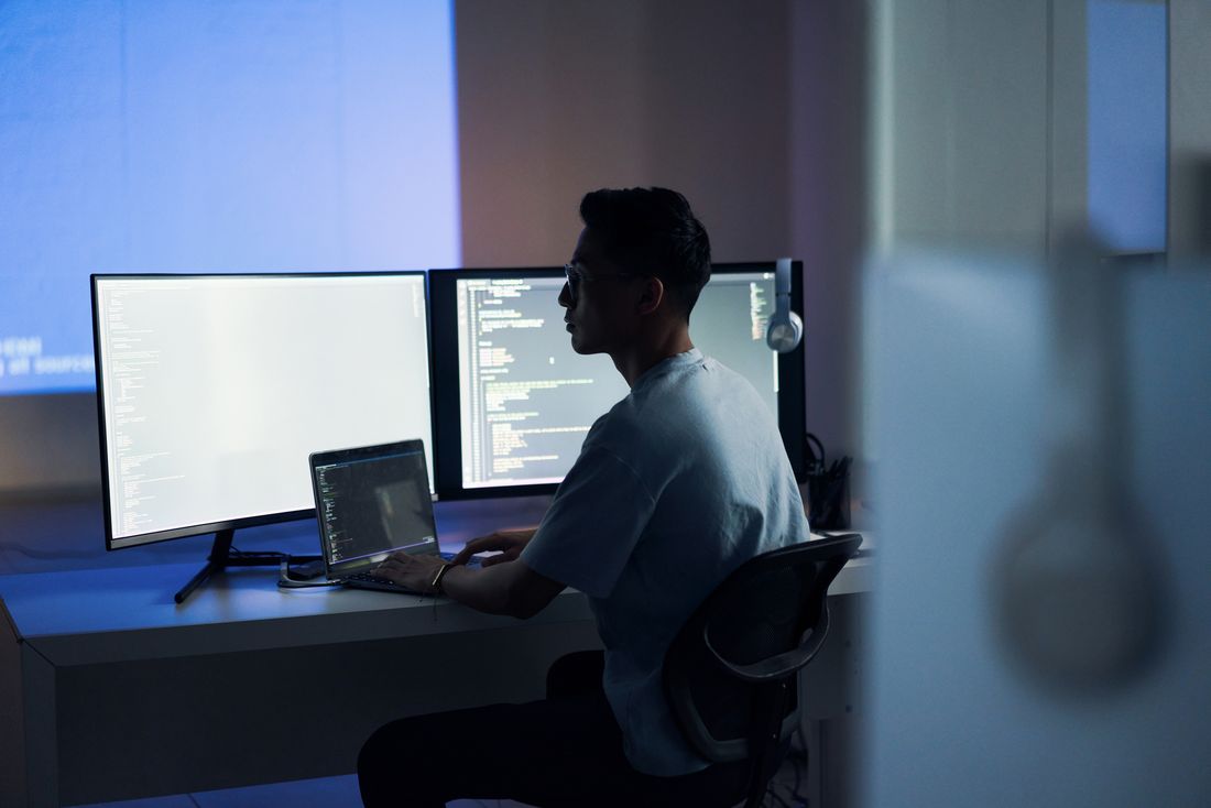 Security analyst monitoring systems around the clock