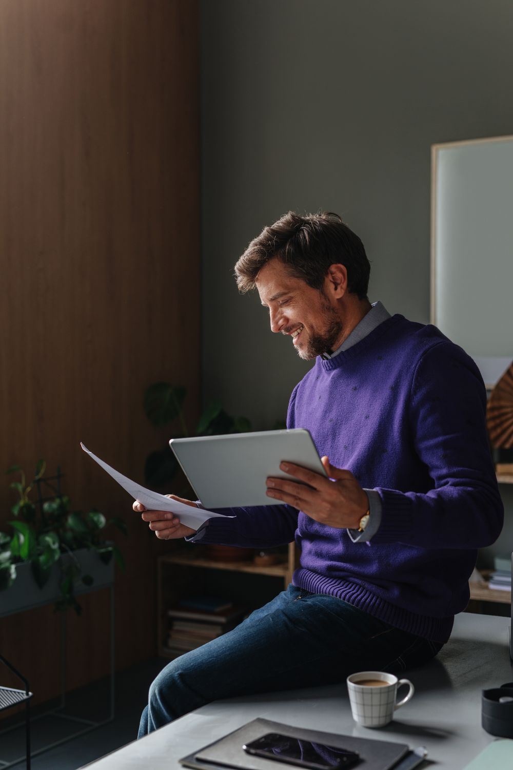 Employee securely working on a tablet in a modern workplace